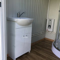 Contenedor sanitario - inodoro + ducha + cisterna