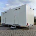 Remolque WC con doble WC 6x2,40 metros.